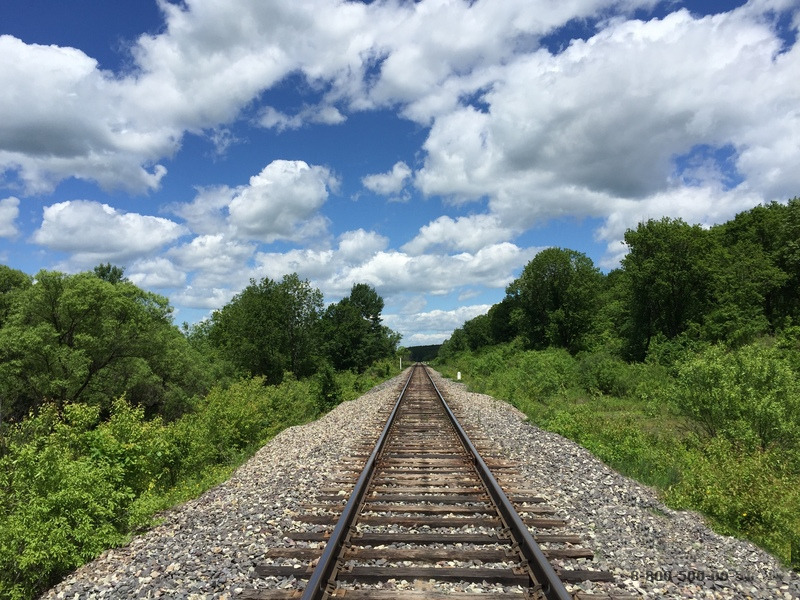 railway-to-horizon-and-clouds-on-the-sky-backgroun.jpg